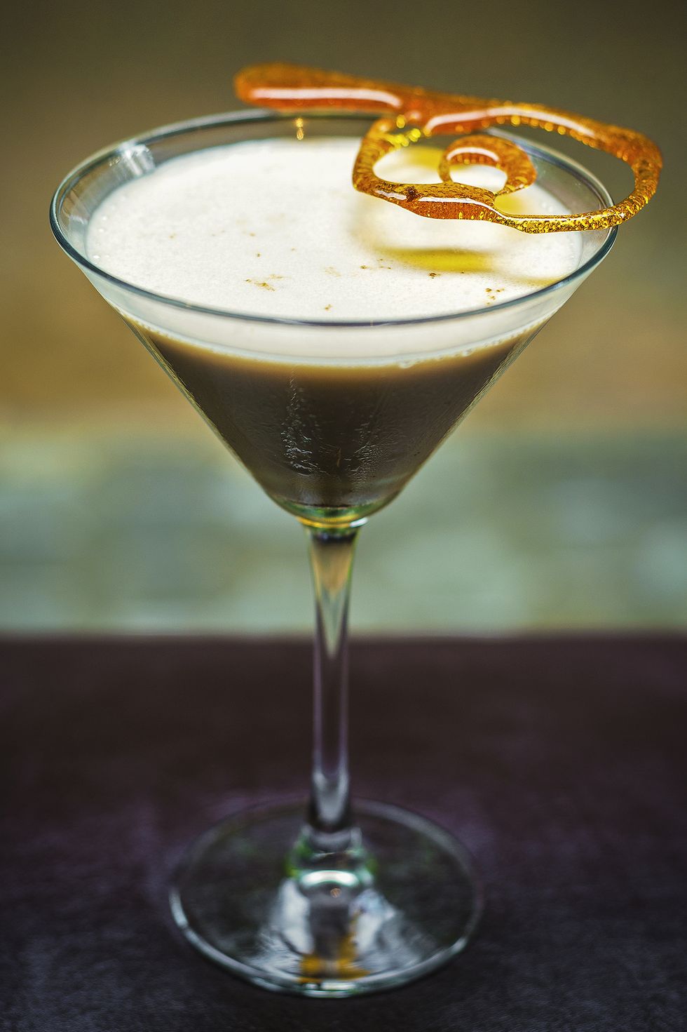 creme caramel cream martini cocktail drink glass  on bar