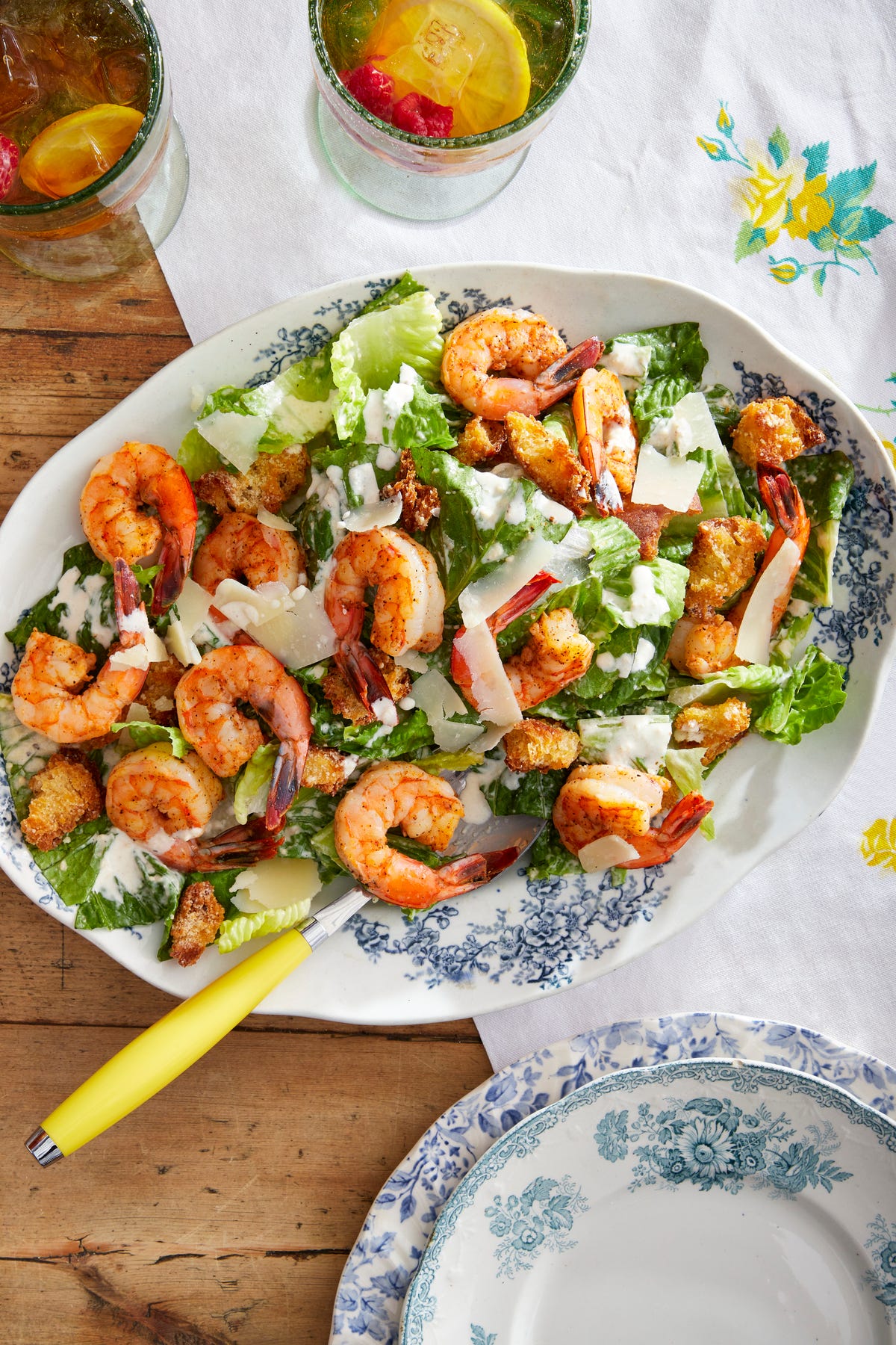 image of Creole Shrimp Caesar Salad With Cheesy Croutons recipe by Country Living