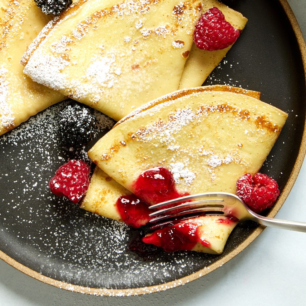 crepes with raspberries, blackberries, and dusted with powdered sugar