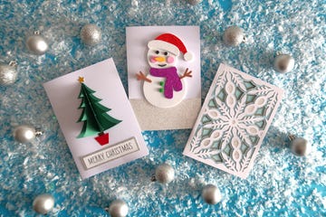 cricut christmas cards on a table