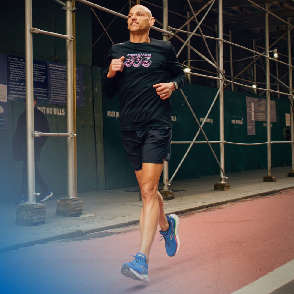a person jogging on a city street