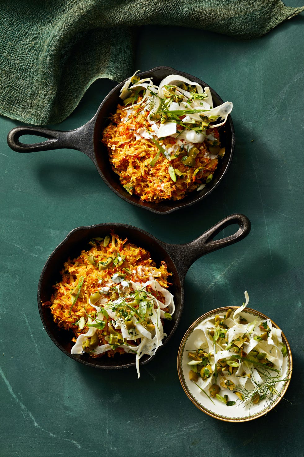 crispy carrot latkes in cast iron pans