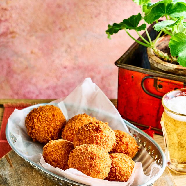 a plate of fried cheese balls