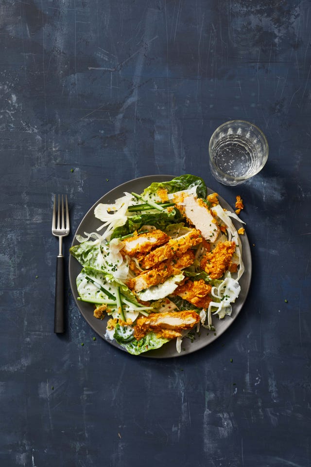 slices of crispy chicken in a salad