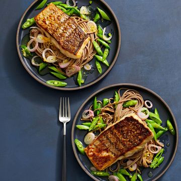 crispy striped bass with soba noodles on a plate