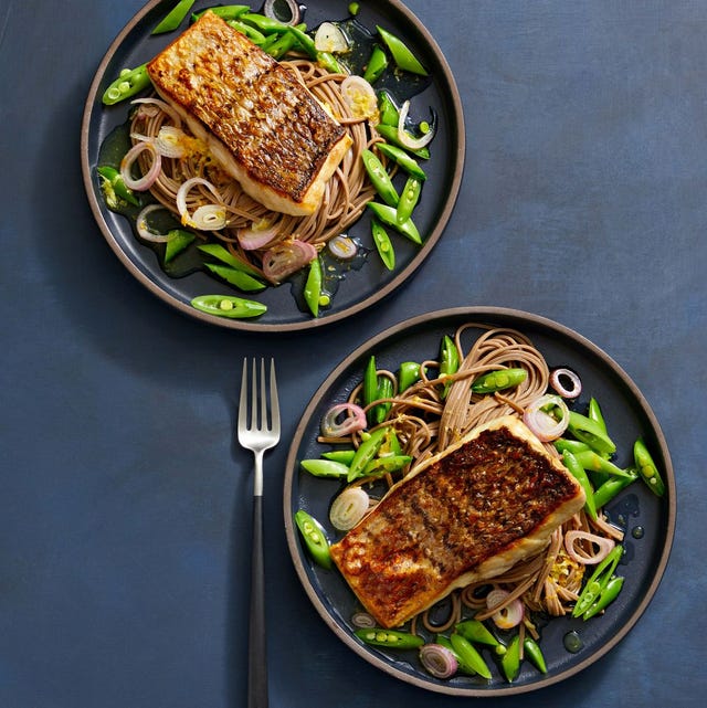 crispy striped bass with soba noodles on a plate