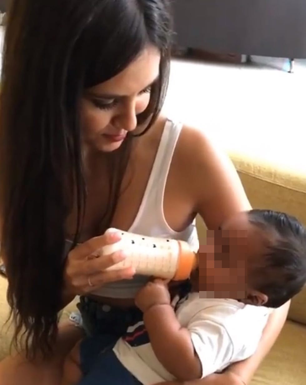 Arm, Child, Hand, Leg, Mouth, Neck, Baby, Gadget, Black hair, Ear, 