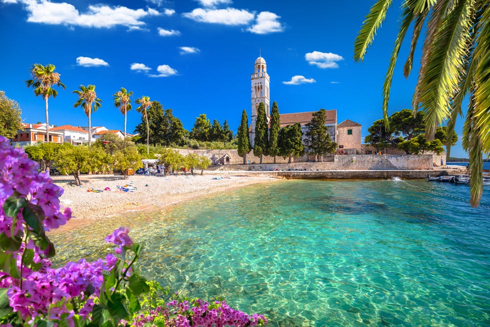 franciscian monastery and turquoise beach on hvar island, archipelago of dalmatia, croatia