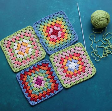 crochet granny squares with crochet hook and yarn