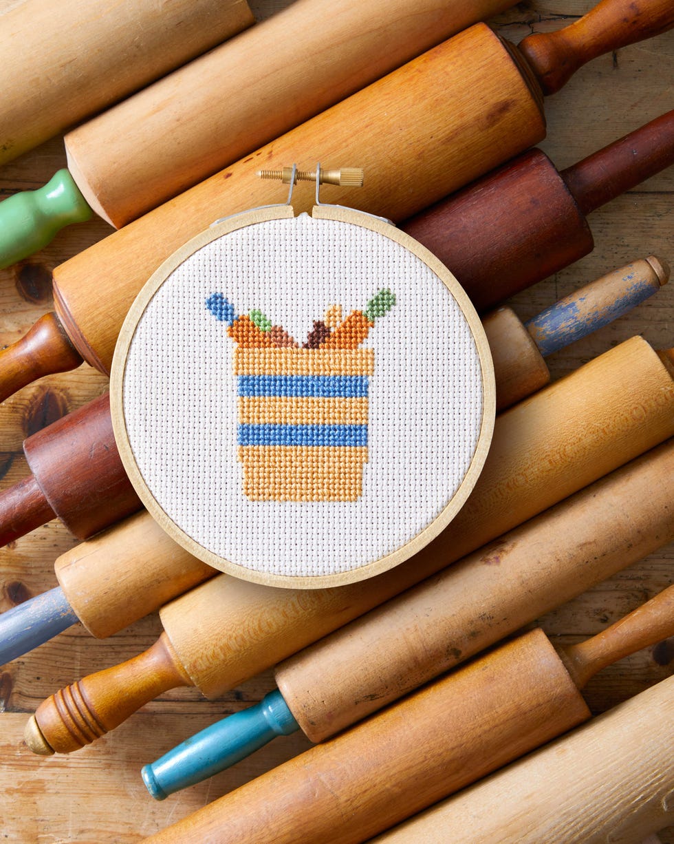 crock cross stitch with rolling pins