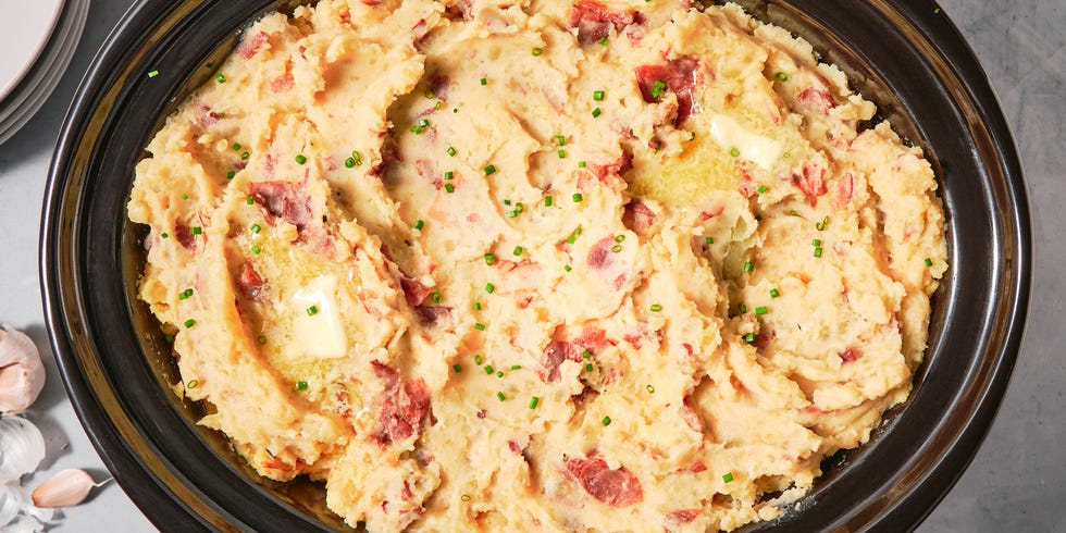 mashed potatoes in a crockpot with garlic and butter