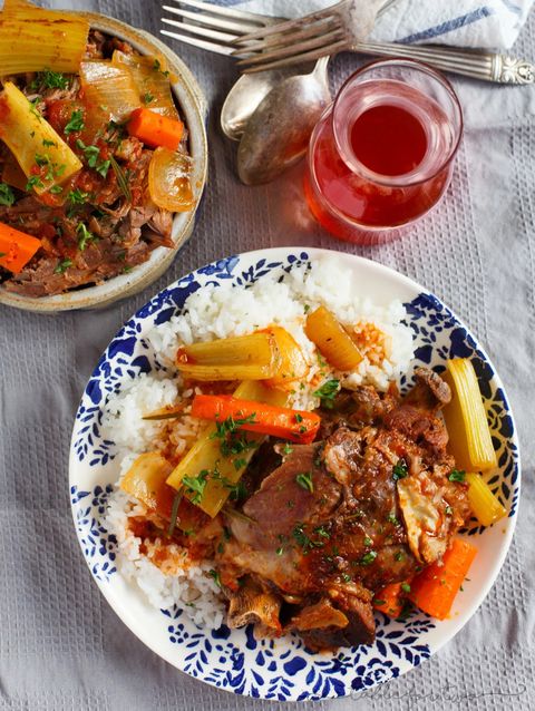 slow cooker osso buco on plate with rice