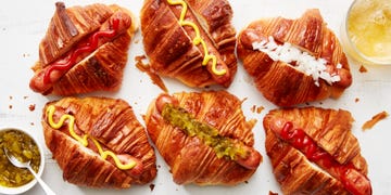 hot dogs in croissants with toppings