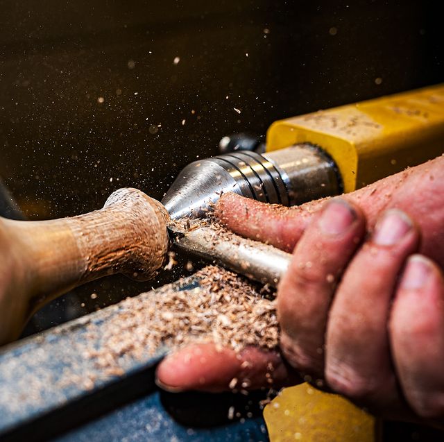 cropped hand of carpenter working in workshop, mogi das cruzes, brazil
