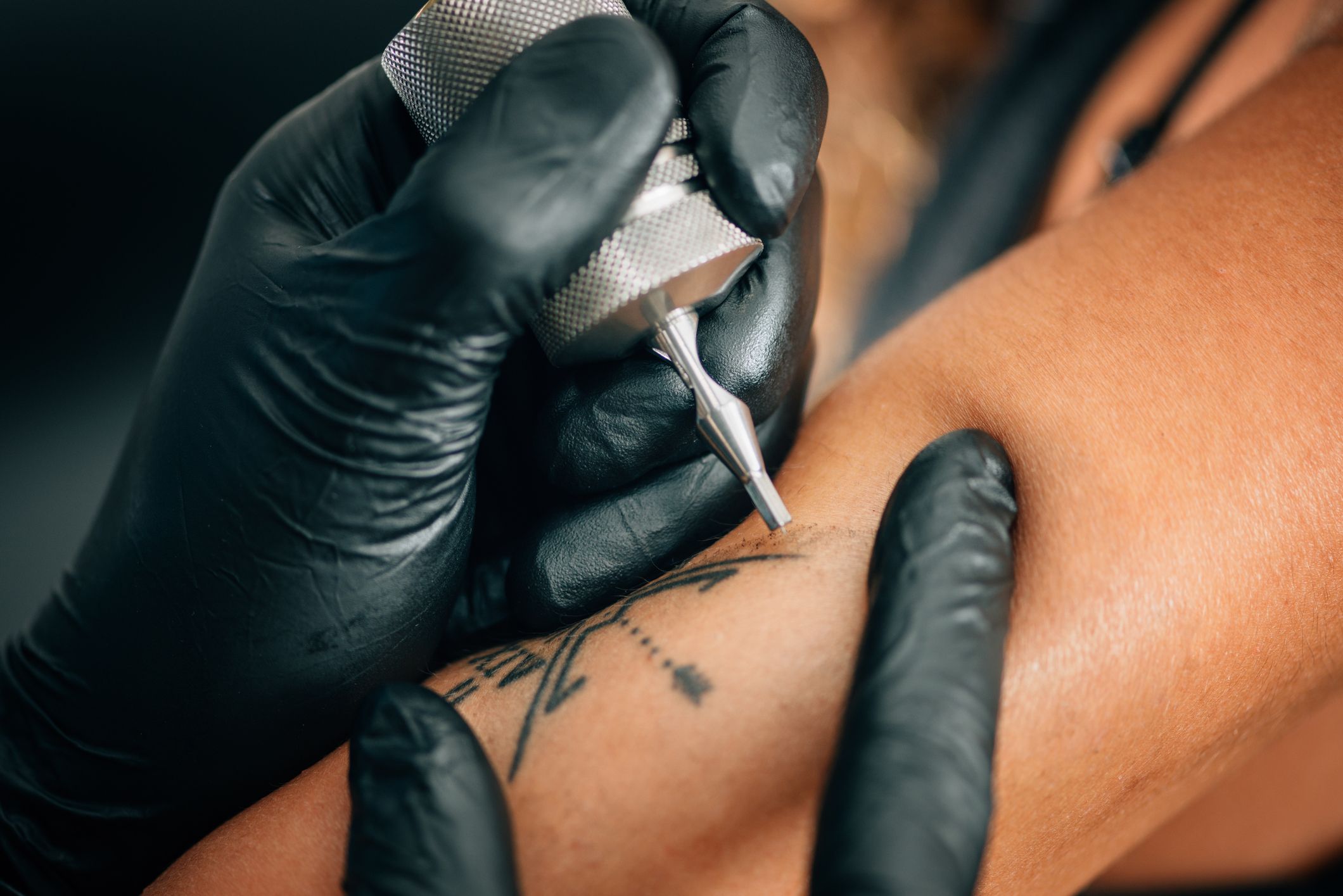cropped image of person tattooing on hand royalty free image 1622131510