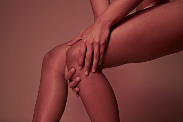 cropped image of woman having knee pains