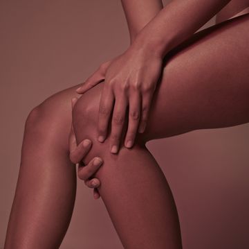 cropped image of woman having knee pains