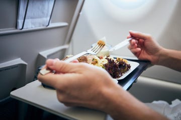 cropped image of woman holding food