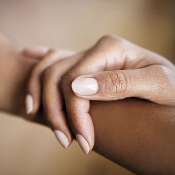 cropped image of woman touching hand
