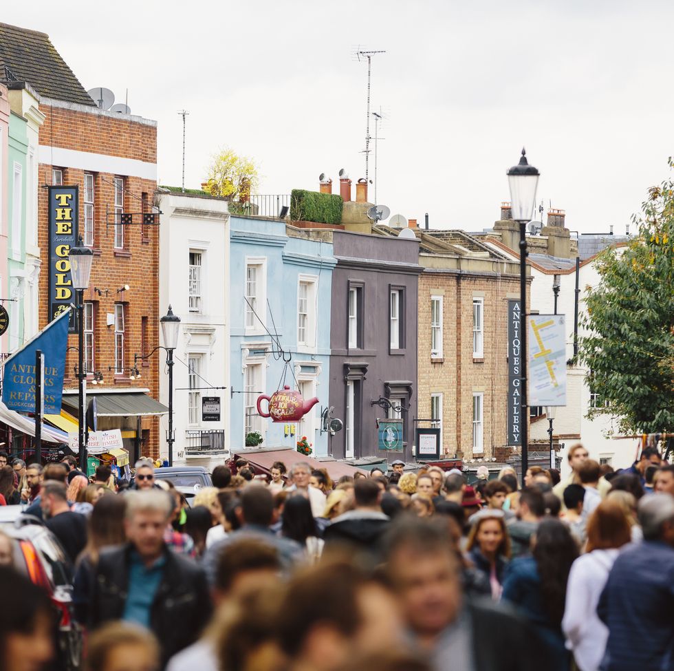 Crowded street at Portobello Road Market in Notting Hill, London, UK