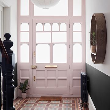 pink front door in hallway
