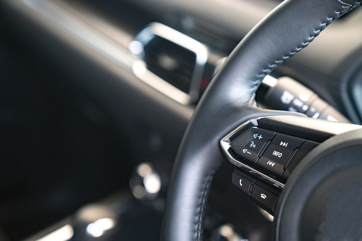 Cruise control buttons on modern car and speed limitation