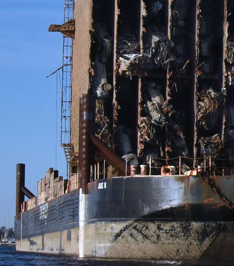 crushed cars are seen in the bow section of the golden ray