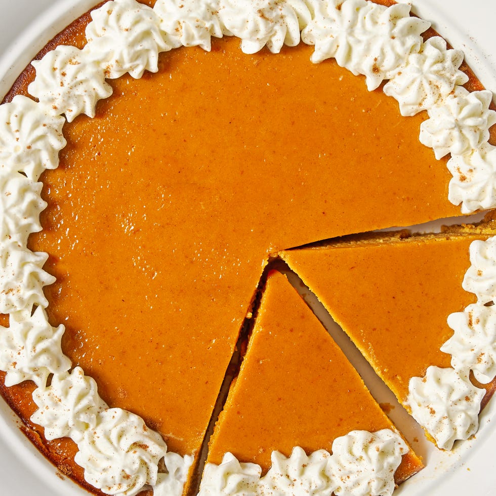 crustless pumpkin pie piped with whipped cream