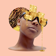 a woman wearing glasses made of gold