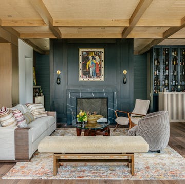 living room with fireplace and bar