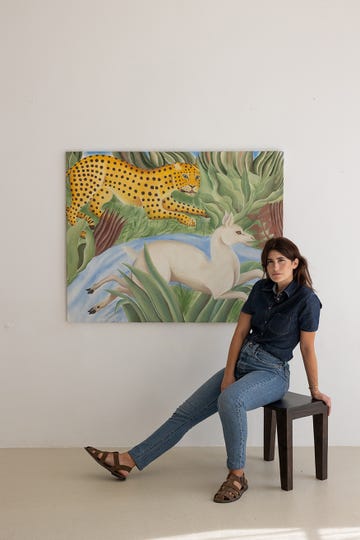 un cuadro de animales en la pared con su autora de gisela talita