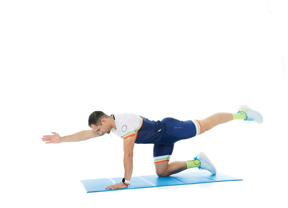 a man doing a plank on a mat