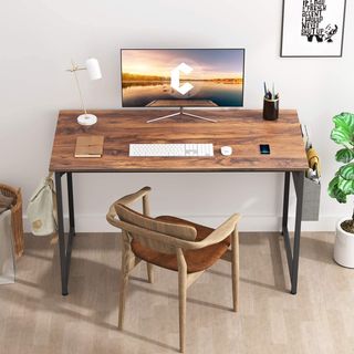 home office area with walnut desk with computer and lamp