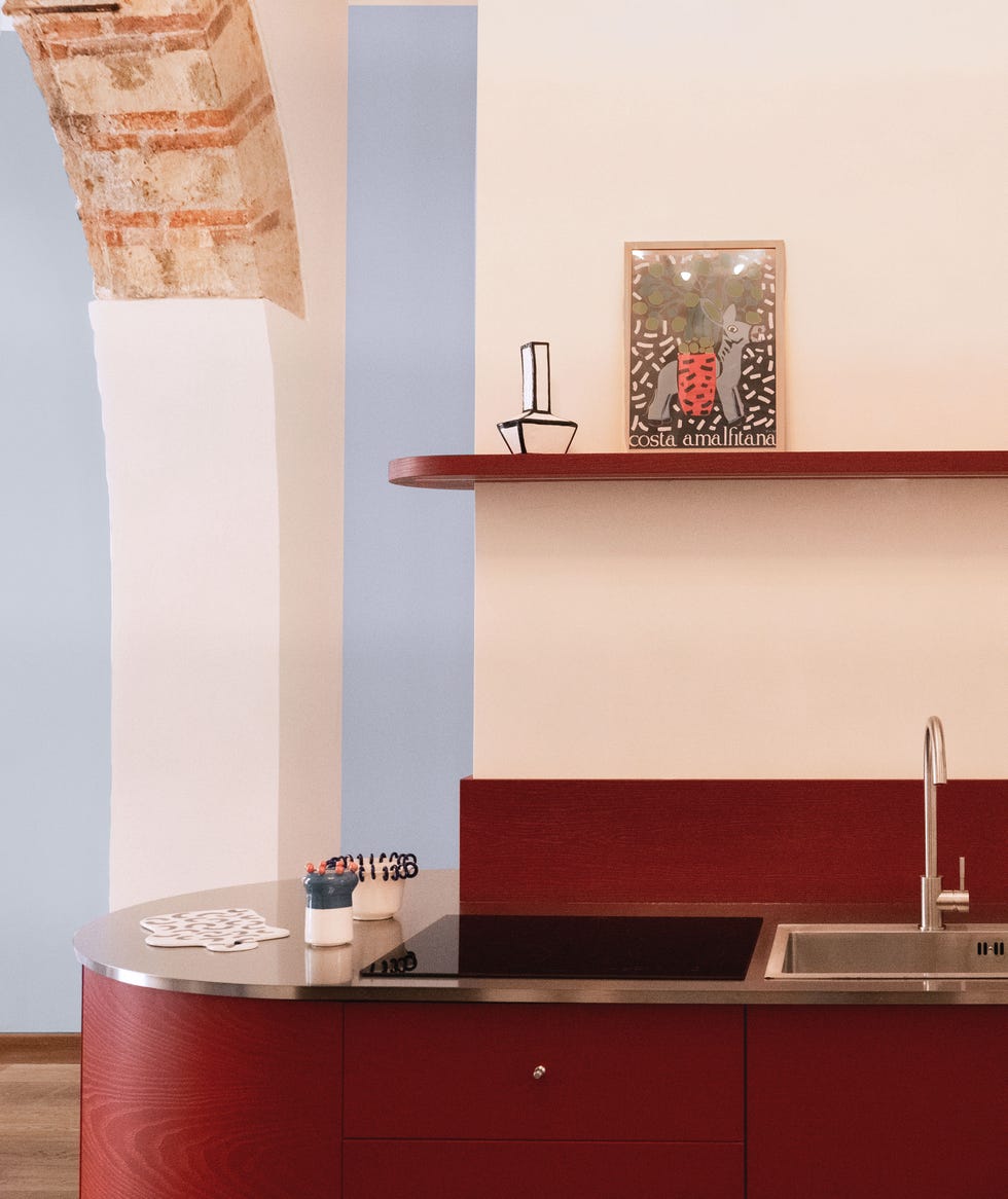 a sink with a shelf above it