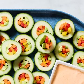 hollowed out cucumber circles with veggies in the middle