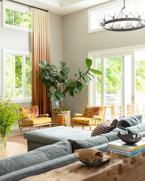 living room with yellow chairs