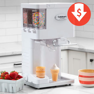 cuisinart soft serve maker with cones, sprinkles, strawberries and bowls