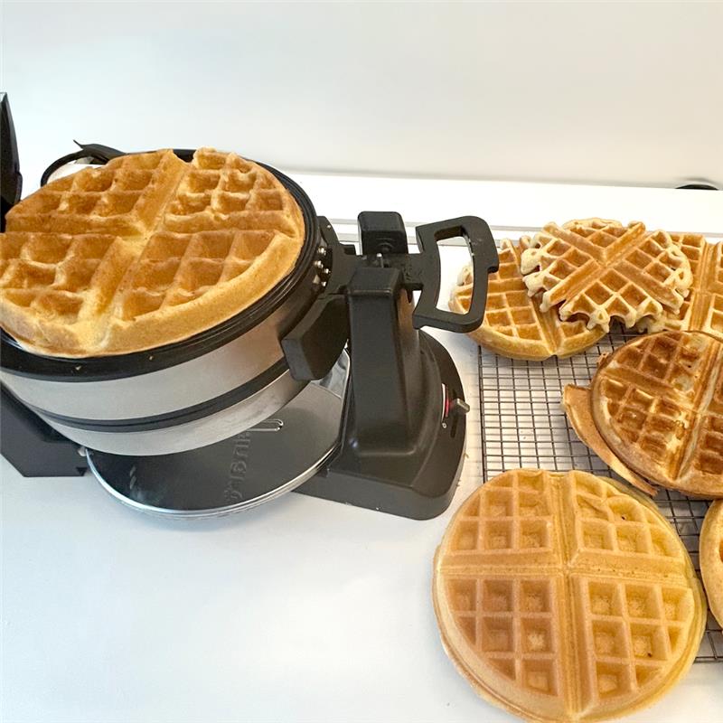 waffle maker with freshly cooked waffles