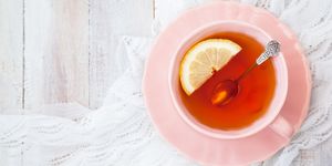 Cup of black tea with lemon