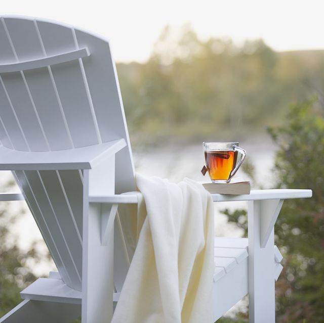 cup of tea on adirondack chair