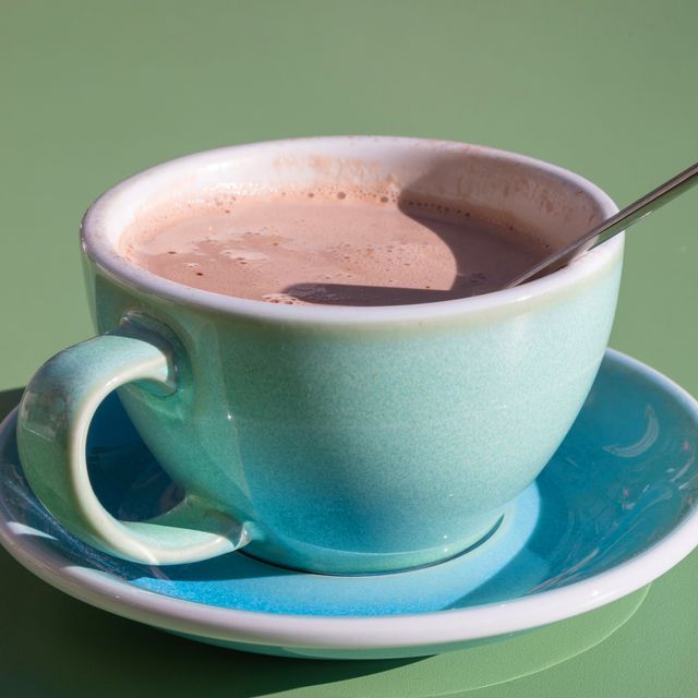 cup of warm chocolate with spoon
