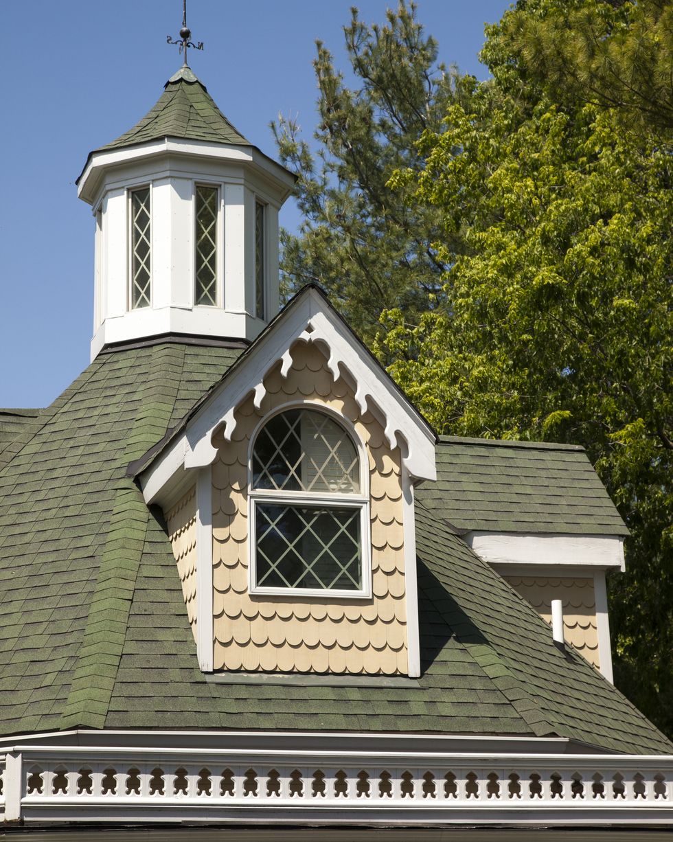 cupola and roof on cottage with intricate woodwork