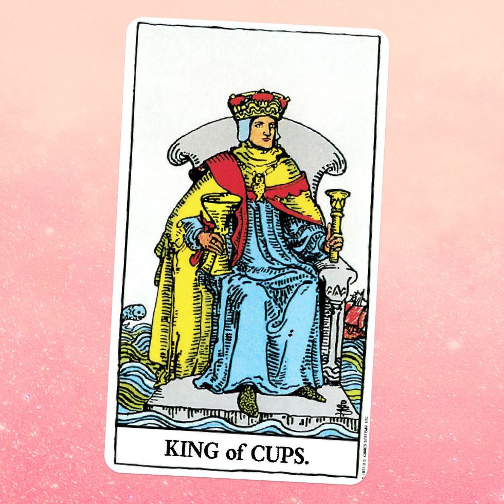 the tarot card the king of cups, showing a person in a robe, cape, and crown sitting on a throne, holding a golden goblet in one hand and a sceptre in the other