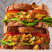curried chick pea salad sandwich with onions and peppers