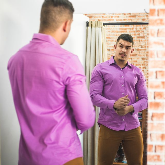 customer tasting clothes in men's clothing