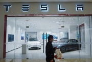 tesla recalls more than 80000 cars
