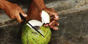 Cut open coconut for coconut water