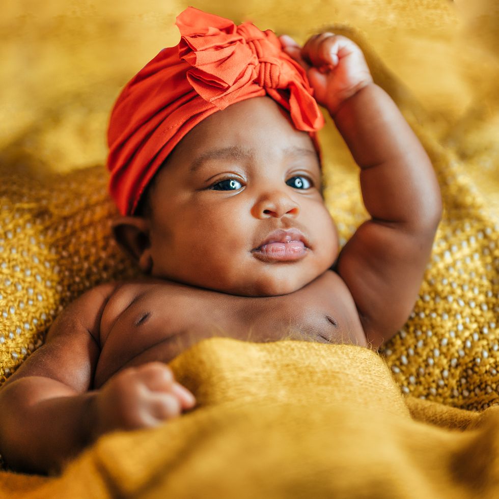 cute adorable portrait of newborn african american baby 3 months old