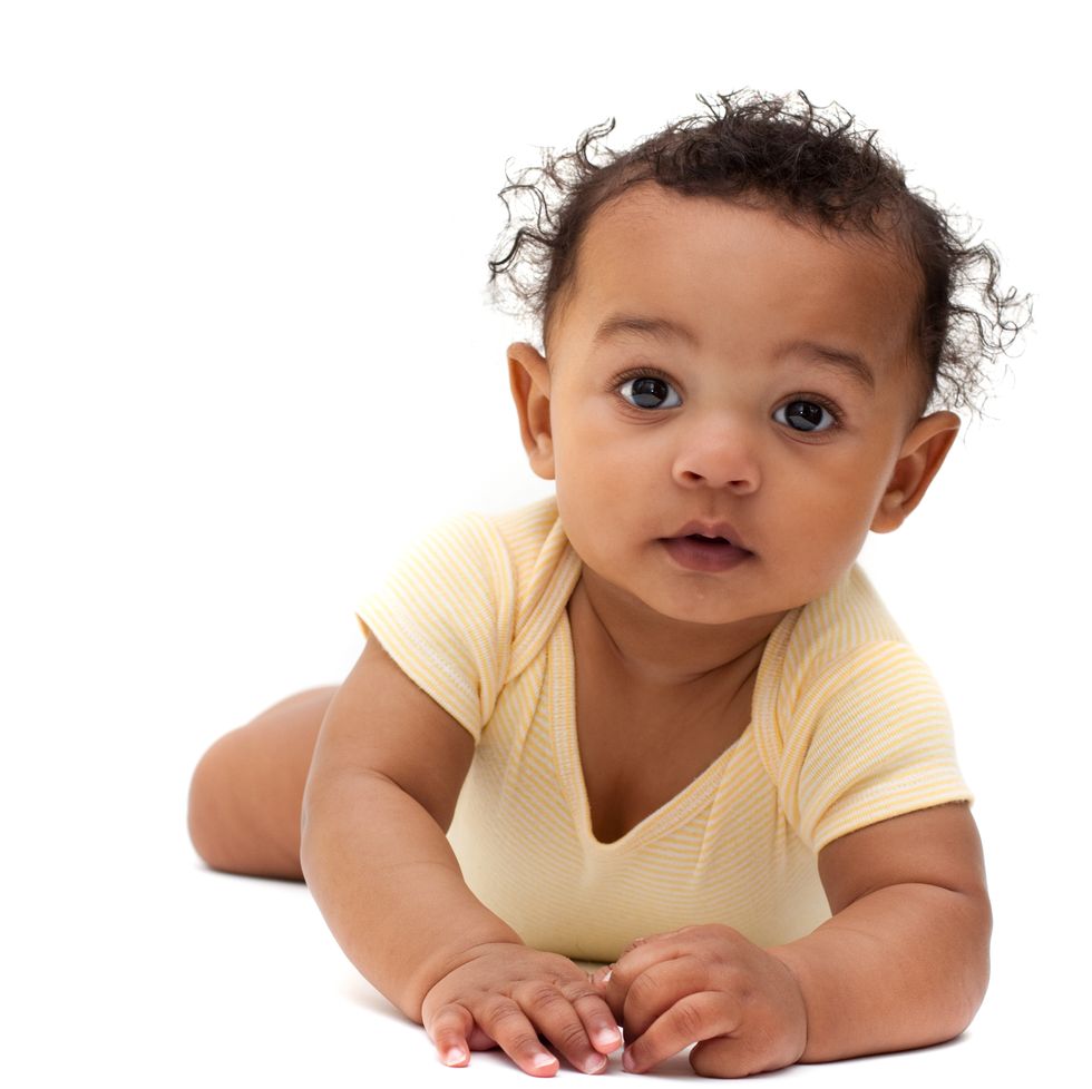 cute african american baby on white background