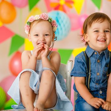cute toddler twins at birthday party